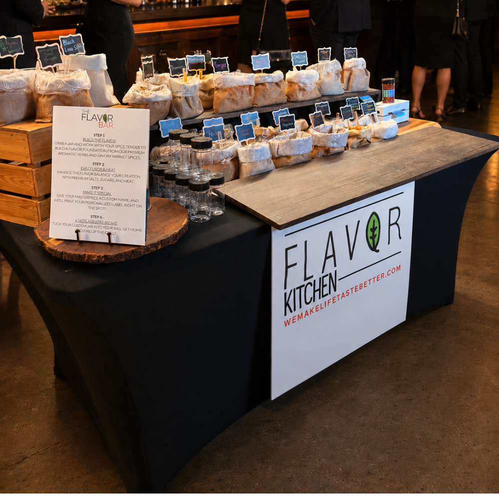 Flavor Kitchen pop-up bar setup with spice bags and custom jars